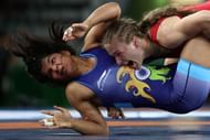 RIO DE JANEIRO, BRAZIL - AUGUST 17: Sakshi Malik (R) of India competes against Valeriia Koblova Zholobova of Russia during a Women's Freestyle 58kg Quarterfinal bout on Day 12 of the Rio 2016 Olympic Games at Caioca Arena 2 on August 17, 2016 in Rio de Janeiro, Brazil. (Photo by Lars Baron/Getty Images)